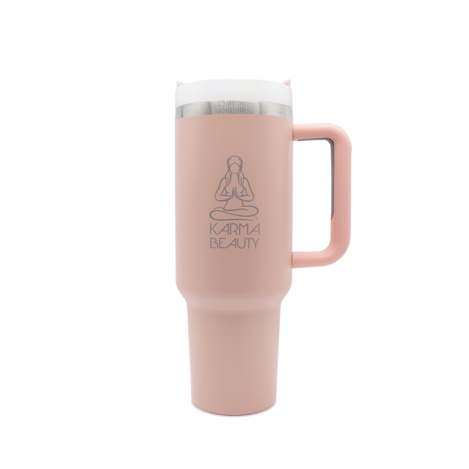 A pink stainless steel tumbler cup with a handle and the 'Karma Beauty' logo printed on the side.