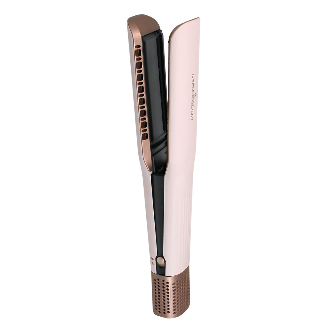 Rose gold and black hair straightener on a white background