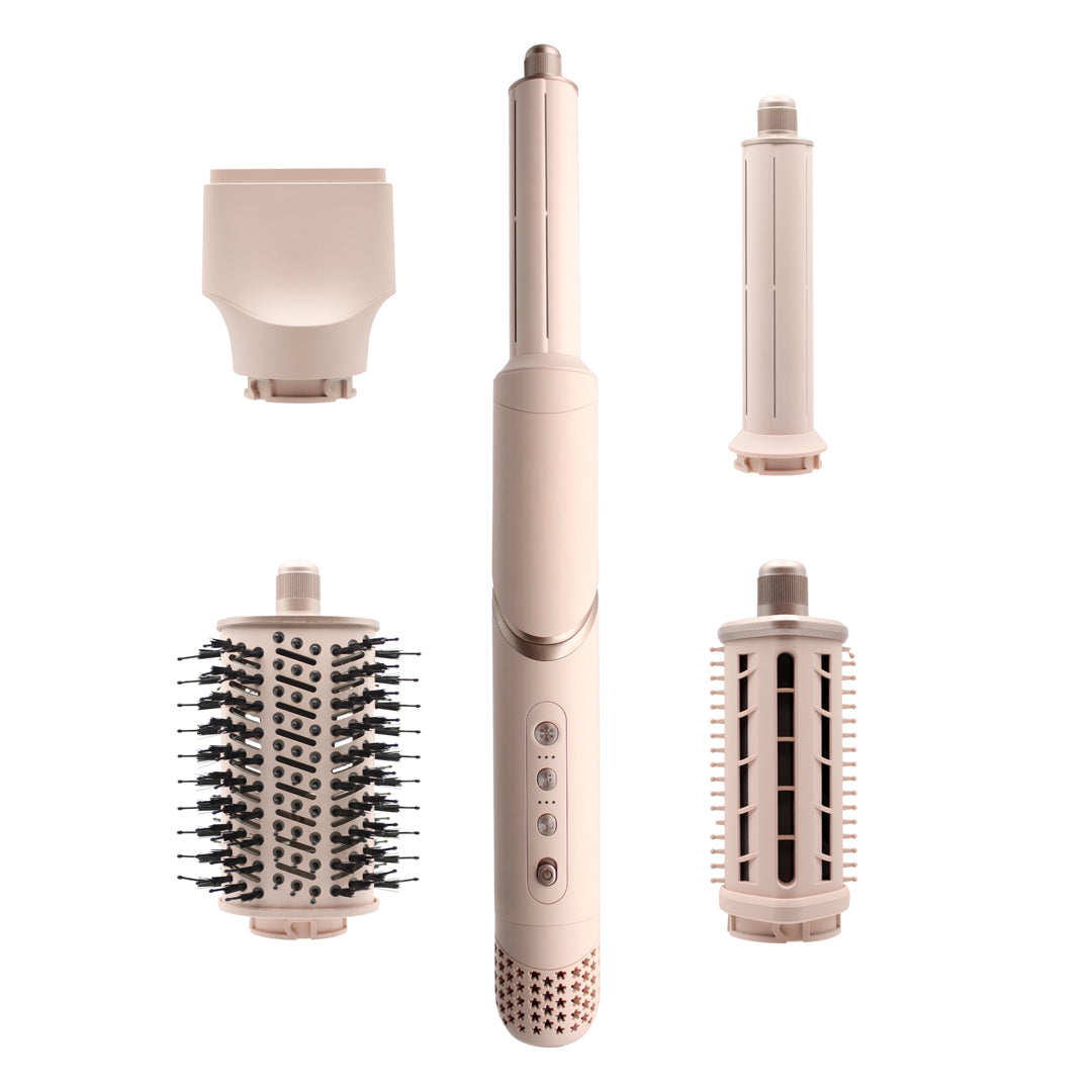 Hair styling tool with interchangeable attachments on a white background