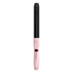Pink and black hair curler on a white background